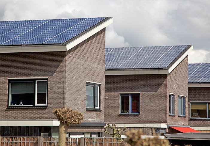 renters Solar panels on house tops in neighborhood - optimised