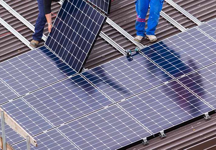 building infrastructure zero emissions Solar Panel and Workers - optimised
