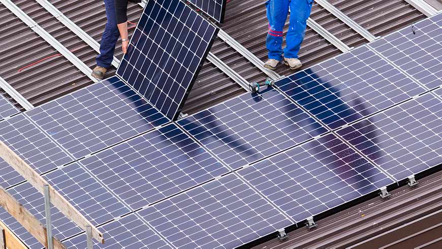building infrastructure zero emissions Solar Panel and Workers - optimised
